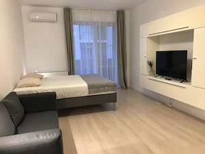 Garsoniera Spatioasa Decomandata Total Utilata si Mobilata cu Parcare Inclusa de Inchiriat  