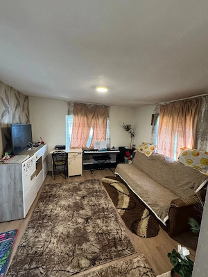 Locuinta la tara  - imagine 4