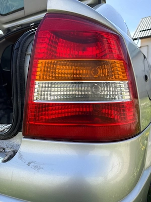 stopuri triple opel astra g