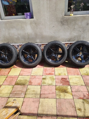 Vind set anvelope vara cu jante aliaj BMW X1  - imagine 3