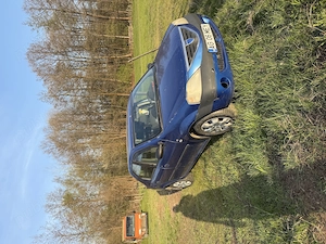 Dacia Logan faza 1 an 2005 - imagine 2