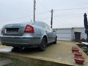 Skoda Octavia 2 (avariata) - imagine 5