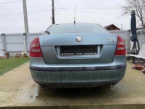 Skoda Octavia 2 (avariata) - imagine 4