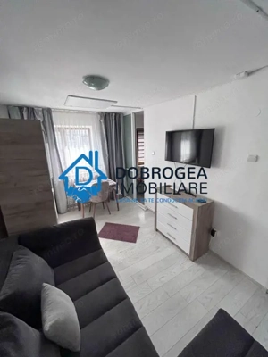 23 AUGUST-GARSONIERA DE INCHIRIAT