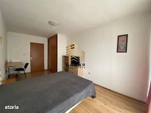 Ofer spre închiriere un apartament spațios  - imagine 6