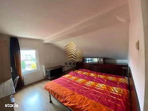 Ofer spre închiriere un apartament spațios  - imagine 5