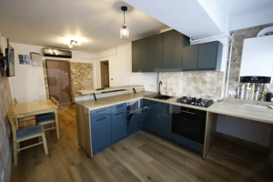 Apartament 2 camere, etaj 1, renovat complet, zona Mărășești - imagine 2