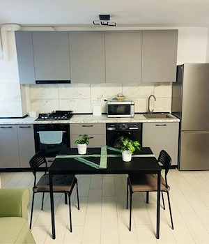 Inchiriez garsoniera 42 m'