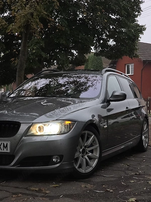 Bmw e91 320d - imagine 5