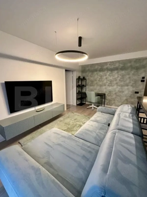 Apartament de lux, 58 mp utili si 52 mp gradina, zona semicentrala