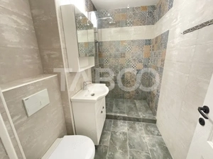 Apartament renovat complet cu 3 camere 2 bai 73 mpu Strand Sibiu - imagine 7