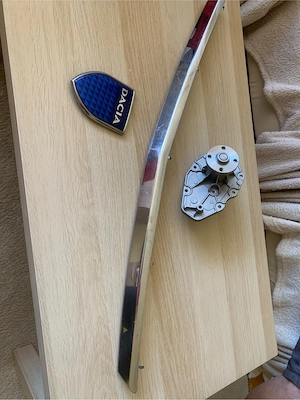 Ornamente grilă față Logan 1și capac pompă Dacia 1300 - imagine 5