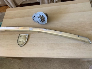 Ornamente grilă față Logan 1și capac pompă Dacia 1300 - imagine 1