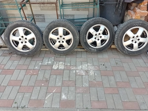 Vând jante aluminiu Skoda Octavia 5x100 cu cauciucuri 195x95x15 cu 2 cauciucuri Continental bune  - imagine 3