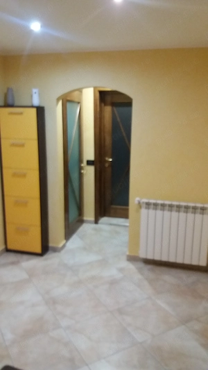  propune spre inchiriere apartament cu 2 camere situat in cartier Neagoe Voda - imagine 2