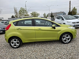 FORD FIESTA 2009 1.3 benz clima incalzire scaune jante 180000 km superba  - imagine 2