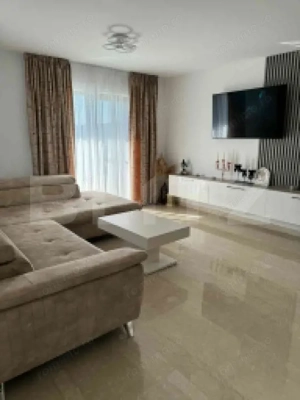 Apartament cu 3 camere în suprafață de 110 și un teren de 400 mp