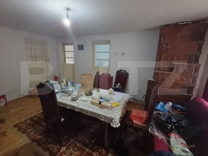 Casa de vanzare, la strada principala, zona ARCANI 