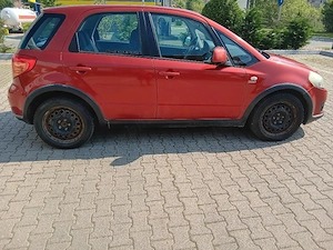 Suzuki SX4 diesel unic proprietar - imagine 2