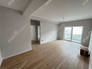 Apartament la cheie cu 3 camere 2 bai 2 balcoane parcare zona Brana - imagine 2