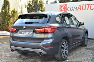 BMW X1 xDrive20i AT - imagine 6