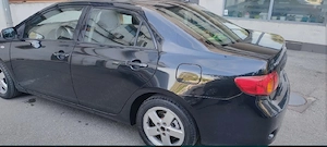 Toyota corolla 1.6 cu doua seturi de jante - imagine 2