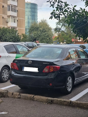 Toyota corolla 1.6 cu doua seturi de jante - imagine 6