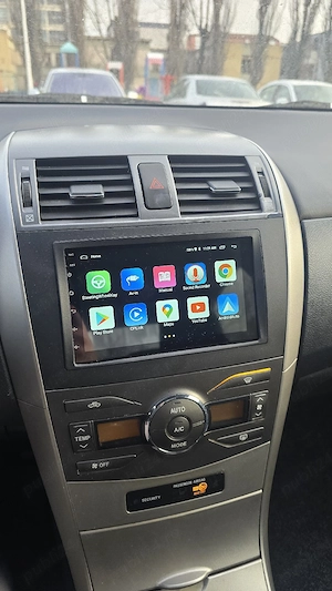 Toyota corolla 1.6 cu doua seturi de jante - imagine 9