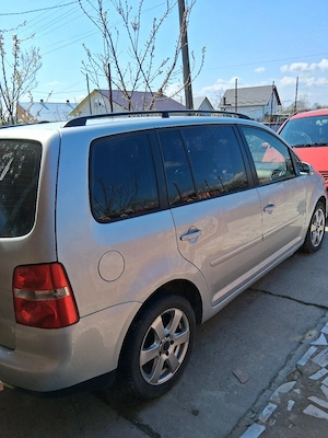 de vinzare saran 2001Turan 2004