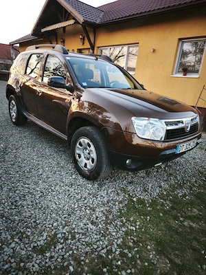 Dacia Duster 2x4, an 2011 - imagine 2