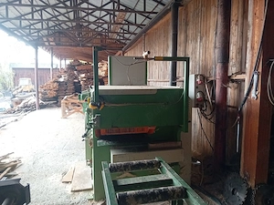 Multilama nemteasca cu rola de evacuare cu descarcare stanga