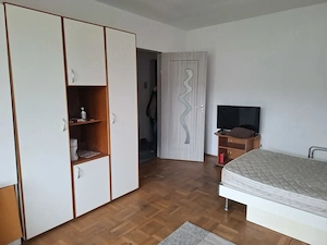 Ap decent 1 cam ultracentral la Podgoria pe Bulevard total mobilat si utilat etaj 1