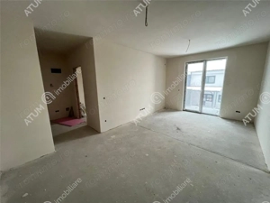 Apartament intabulat 2 camere decomandate si loc parcare in Talmaciu - imagine 2
