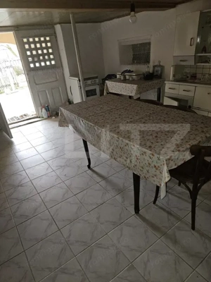 Casa plan parter plus etaj cu 3 camere, 158 mp si 6300 mp teren, zona Balcesti - imagine 4