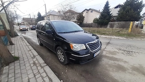 vand Chrysler 2009 cutie automată 