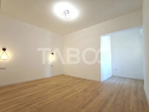 Apartament decomandat - la cheie - 2 camere balcon si loc de parcare - imagine 2