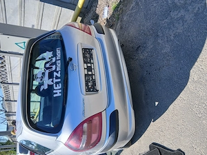 Vand sau schimb nisan almera an 2004 97 cp 1.5 bezina - imagine 4