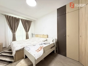 Apartament cu 2 camere, terasa, curte si loc parcare in Dumbravita - imagine 3