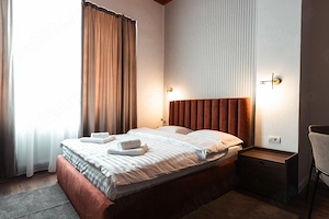 Apartamente si camere in regim hotelier