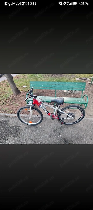 Vând Bicicleta full electrica