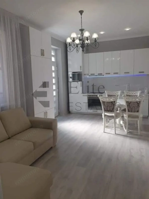 Apartyament cu 3 camere de inchiriat central - imagine 3