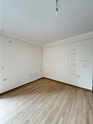 BRAYTIM - 2 CAMERE - ETAJUL 1 - RULOURI ELECTRICE - PARCARE INCLUSA - FINISAJE DE TOP - imagine 2