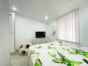 Închiriez  apartament  cu  2  camere c - imagine 2