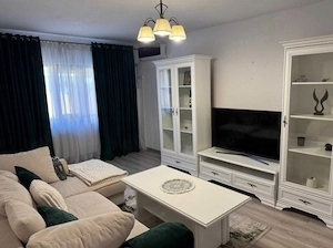 Inchiriez apartament cu 2 camere, decomandat, loc de parcare 24 7, zona 8 Mai, aleea Ioan Slavici. 