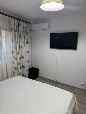 Inchiriez apartament cu 2 camere, decomandat, loc de parcare 24 7, zona 8 Mai, aleea Ioan Slavici.  - imagine 3