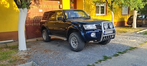 Nissan patrol y61 2004 3.0 5 usi, 7 locuri - imagine 2