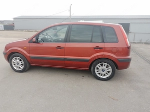 Ford Fusion proprietar 74 MIi KM - imagine 10