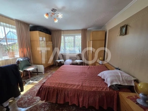 Casa individuala de vanzare 3 camere curte si gradina Beclean - imagine 7