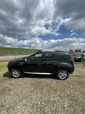 Dacia Duster 4x4 ,1.6 benzin 105 cai putere - imagine 2