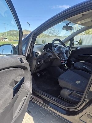 Opel Corsa model 2014 mot 1.3 CDTI euro 5 - imagine 9